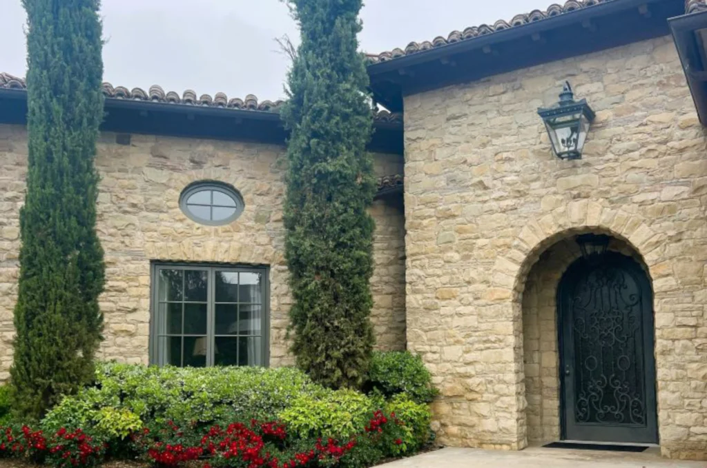 Euro Blend natural stone veneer on Old World custom home facade